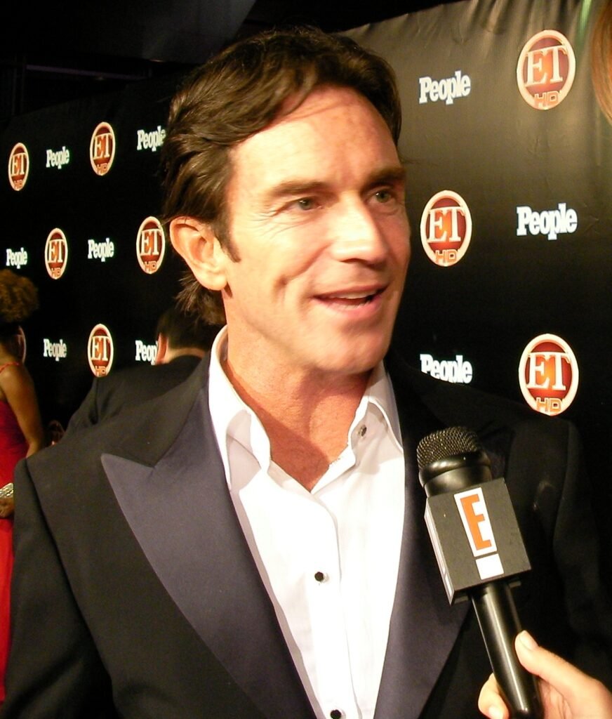 Jeff Probst at an event, wearing a suit.